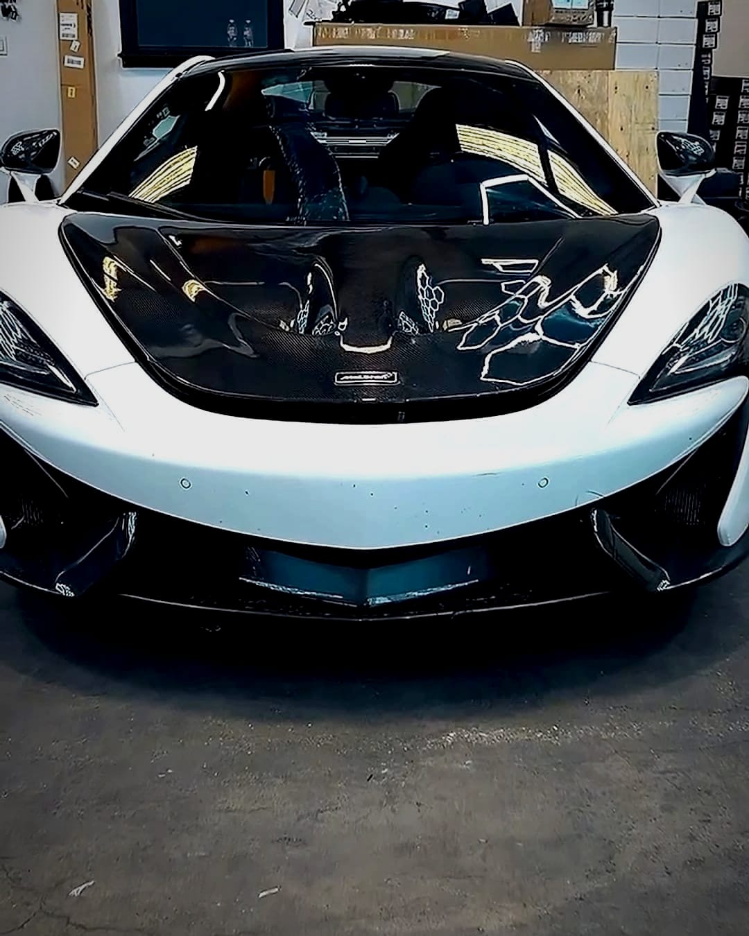 McLaren 570 in the ElitePro shop for a windshield replacement